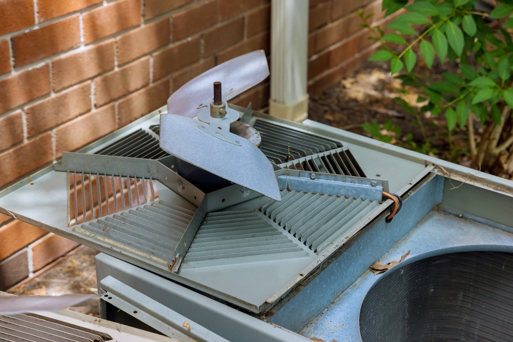 HVAC technician providing 24/7 HVAC services during an emergency same-day repair visit