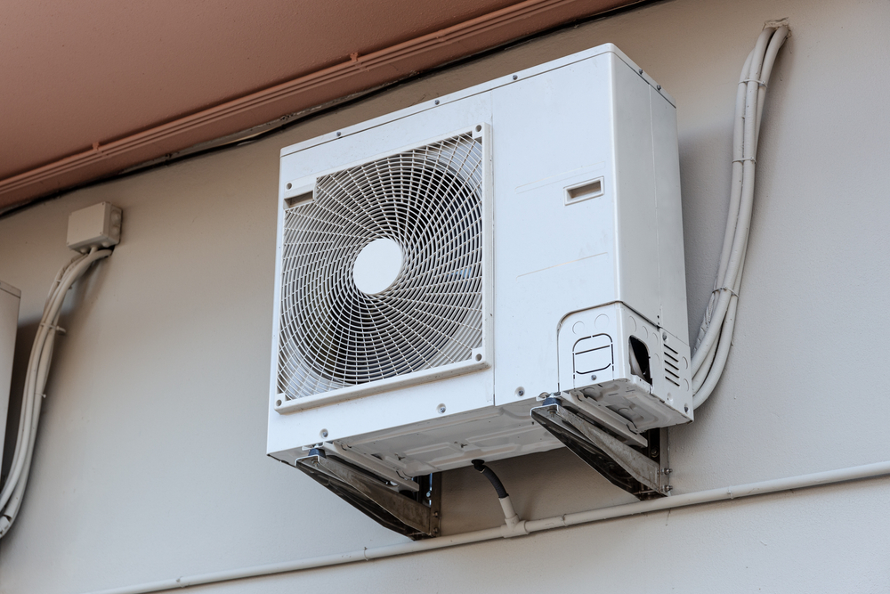 HVAC technician installing a ductless mini split system in Powell and Upper Arlington