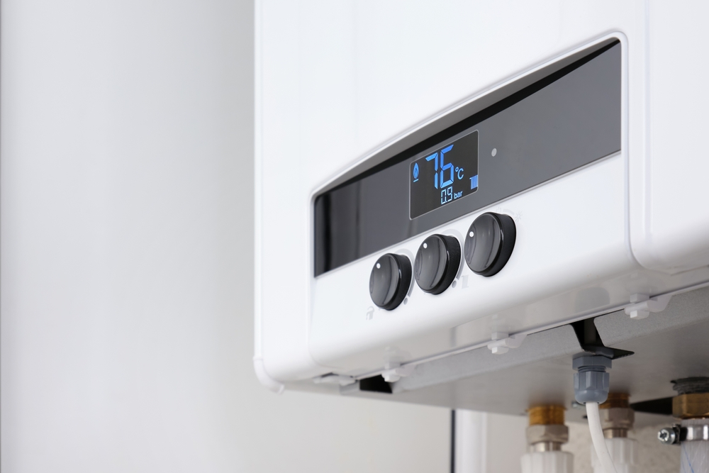 Homeowner selecting a water heater based on family size and hot water needs