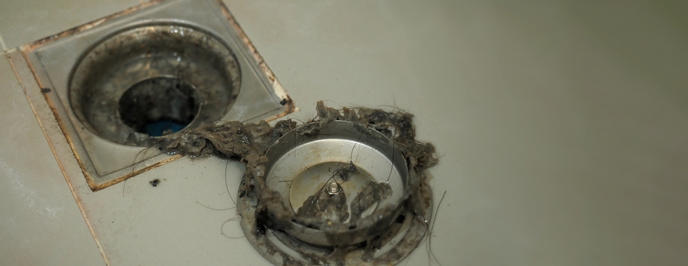 Common causes of clogged drains in Dayton and professional drain cleaning solutions for residential plumbing systems