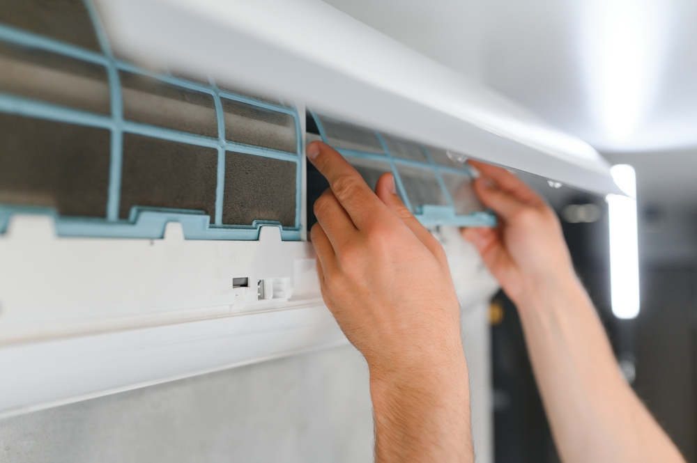 technician performing air conditioning repair steps in fast when your system struggles